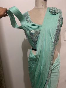 Elegant Mint Green Saree with Embellished Blouse