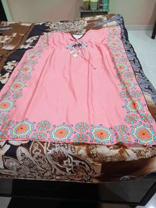 aComfortable Peach Kaftan dress