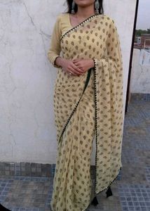 Beautiful Beige Printed Saree with Green Border &