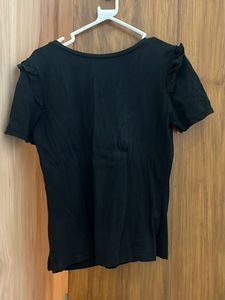 Elle Black Top with Floral Shoulder Detail