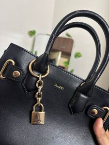 Chic Black Aldo Handbag with Lock Detail