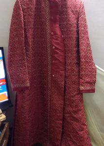 SHERWANI 36 SIZE RED COLOUR WITH HEAVY WORK IN IT FOR GRAND FUNCTIONS AND PARTIES READY TO USE CONDITION