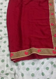 Elegant Red Saree with Gold Border