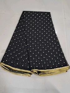 Elegant Black Saree with Gold Accents