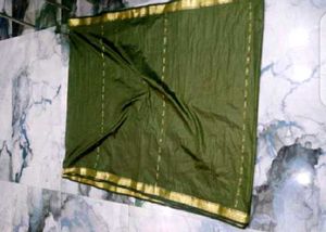 Elegant Green Saree with Gold Border