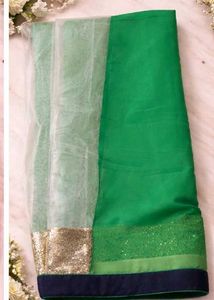 Elegant Green and white Saree with Glittery Bo