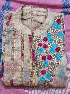 Elegant Beige Kurti with Floral Border