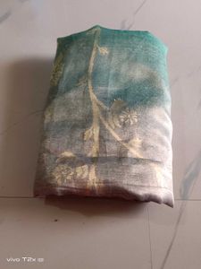 Beautiful Teal Saree with Golden Print
