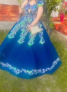 Beautiful Blue Clr Ball Gown With Very Heavy Flare