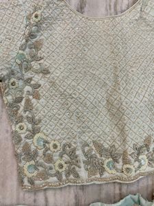 Elegant Mint Green Embellished Lehenga Choli