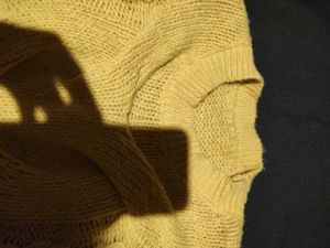 Yellow knitted sweater