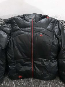 Black Puffer Jacket with Red Accents