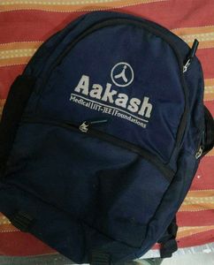 2 Tshirts and 1 Bag Aakash institute
