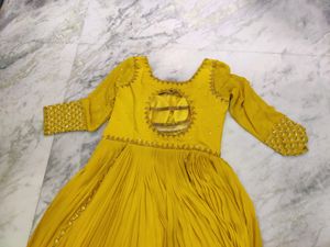 Yellow gown with heavy work