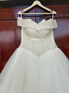 Elegant White Off-Shoulder Wedding Gown