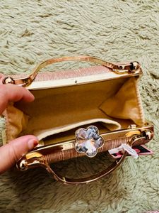 Elegant Rose Gold Clutch Bag