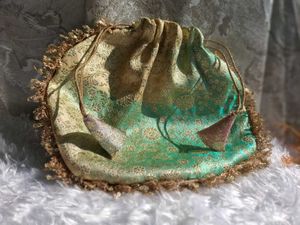 brocade pastel color potli bag