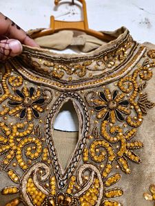Elegant Beige Embroidered Anarkali Gown