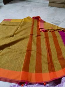 Mustard Yellow linen Saree with Tassels