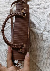 Chic Brown Handbag with Gold Logo