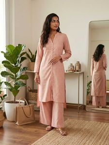 Elegant Peach Kurta with Intricate Detailing