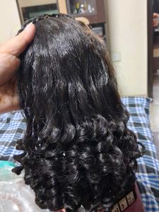 Curly Dark Brown hairs