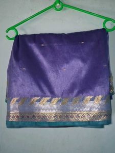 Elegant Purple Saree with Golden Border