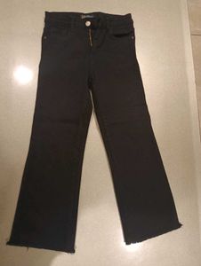 Black Flare Jeans with Raw Hem