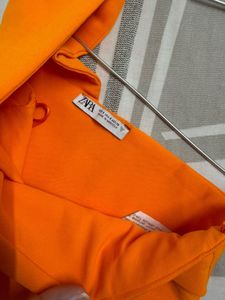 Vibrant Orange One-Shoulder Draped Top