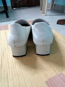 Stylish White Loafers with Buckle Accent