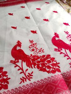 Elegant White Saree with Red Peacock
