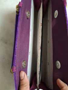 Red,rani pink, and purple Embroidered Clutches