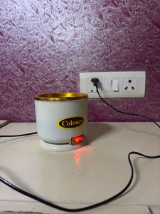 Electric wax heater
