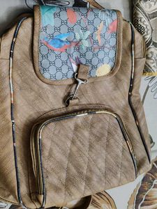 Brown Backpack with 3 chains ⛓️ space