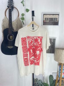 Vintage "Stick to Your Guns" Graphic Tee
