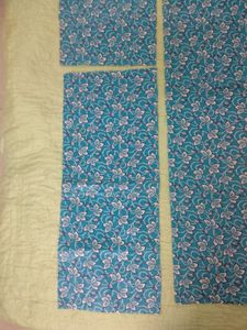 Turquoise blue printed cotton fabric pieces