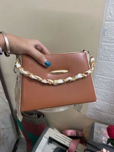 Stylish Brown Handbag with Scarf Detail