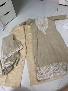 Elegant Beige Kurta Set with Intricate Lace