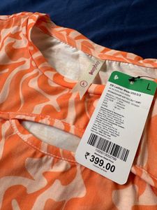Orange Swirl Cut-Out Long Sleeve Top