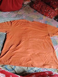 237. Orange oversized tshirt