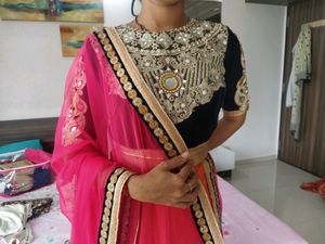 Velvet blouse with net dupatta and lahenga.    nav