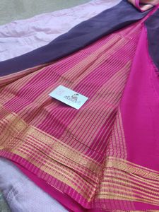 Premium crepe silk saree with tanjore clutch