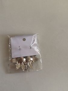 Silver Flower Statement Earrings