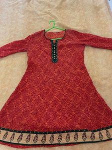 Orange Kurta with Green Neckline