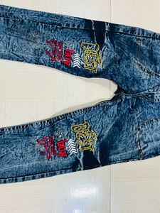 Kids Distressed Blue Jeans with Graphic Print