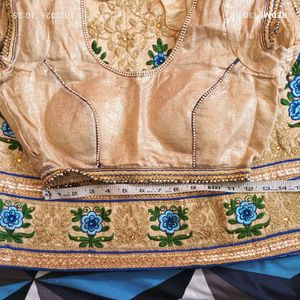 Beige Lehenga Choli with Blue Floral Embroidery