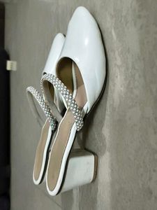 White Heels with Sparkling Rhinestone Strap.
