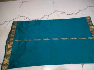 Teal Silk Saree with Gold Peacock Border