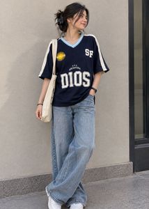Oversized T-shirt + Light Blue Wide-Leg Jeans