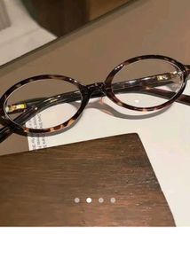 savana leopard print round glasses